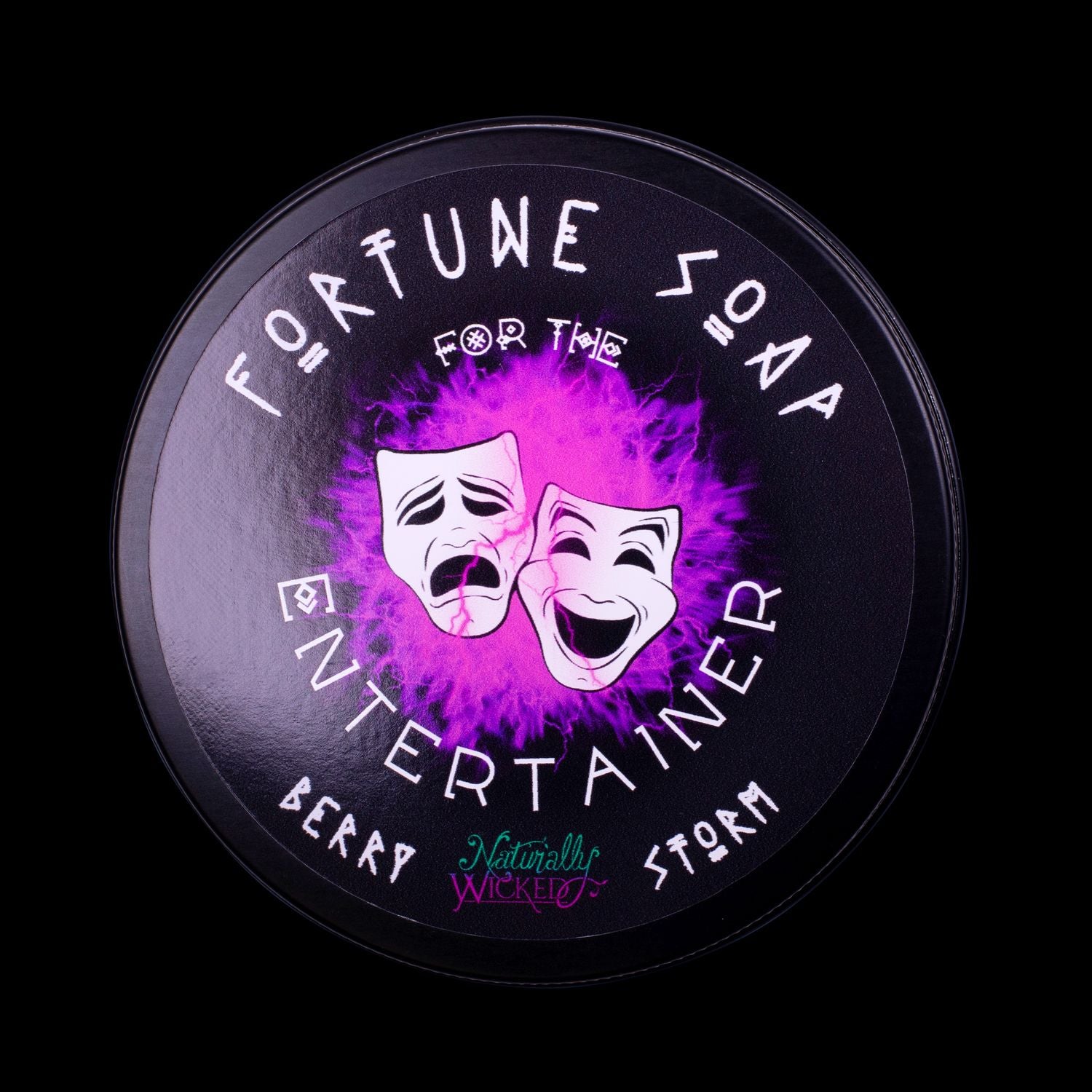 Naturally Wicked Fortune Soap For The Entertainer. Purple Plant-based Soap With Amethyst Rune Crystal, Scented With Berry Storm All Situated In A Black Glossy Gift Tin.