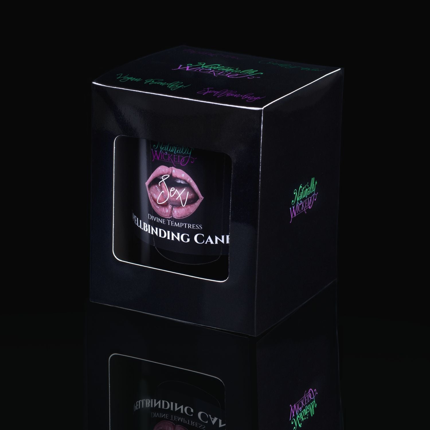 The Perfect Spell Candle To Release Sexual Desires. Naturally Wicked Spellbinding Sex Candle Displayed In A Sleek Black Gloss Gift Box. The Candle Features Plant-Based Smooth Pink Wax, A Wood Wick And A Beautiful Rhodonite Crystal.