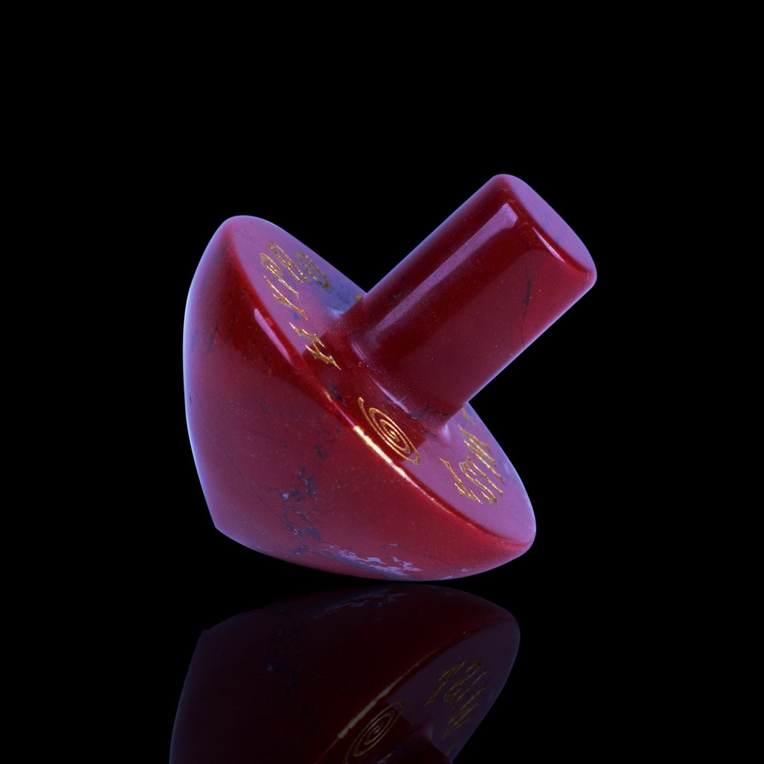 Naturally Wicked Exclusive Hypnotwister. A Red Jasper Crystal Spinning Top Engraved With Hypno Twist