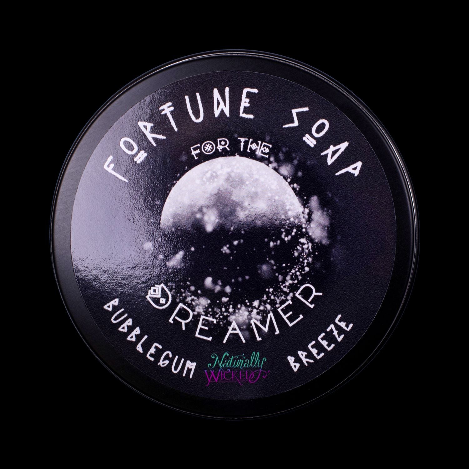 Naturally Wicked Fortune Soap For The Dreamer. Black Plant-based Soap With Black Obsidian Rune Crystal, Scented With Bubblegum Breeze All Situated In A Black Glossy Gift Tin.
