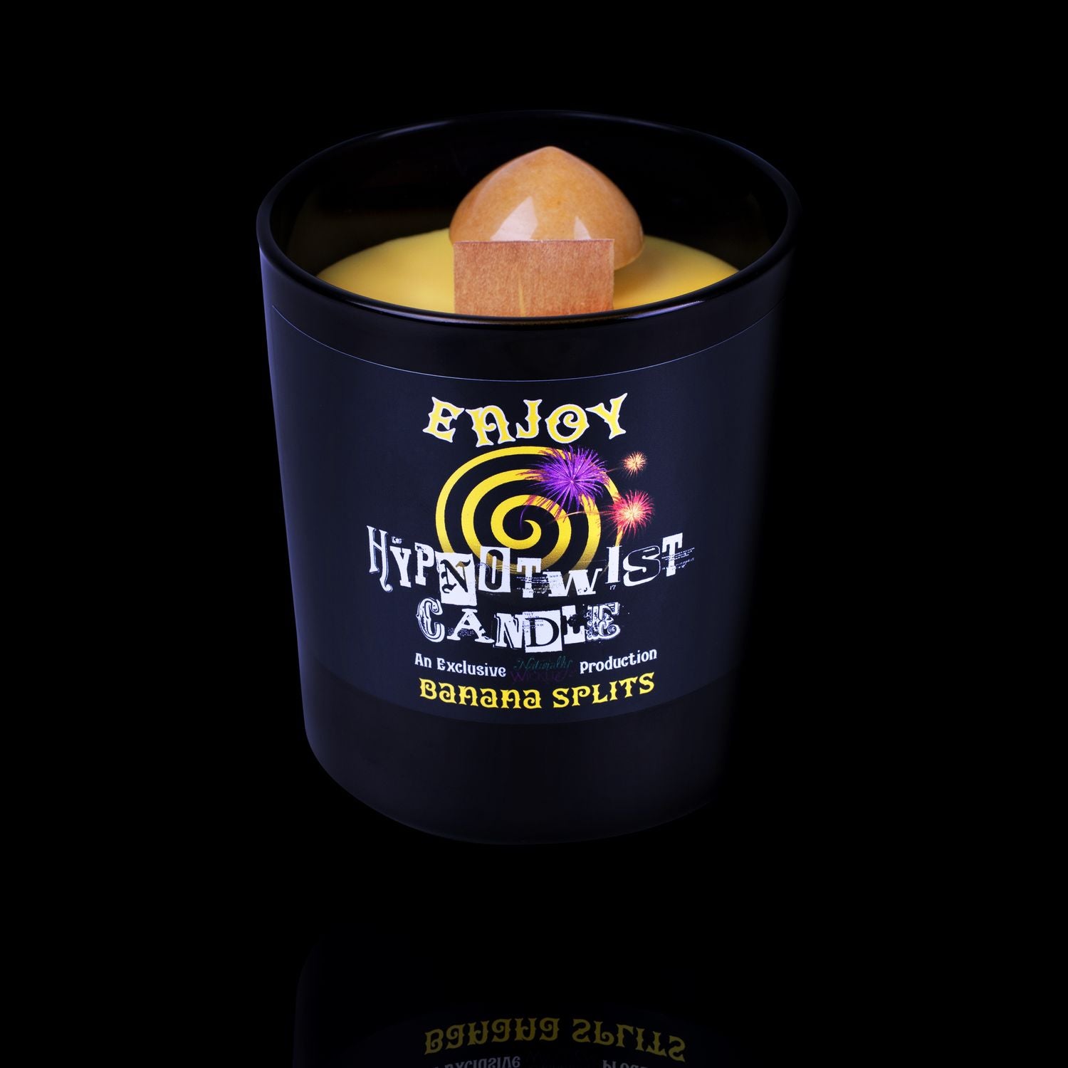 Naturally Wicked Hypnotwist Enjoy Candle Featuring Plant-based Soy Yellow Wax Scented with Banana Splits & Includes A Yellow Jade Crystal Spinning Top.