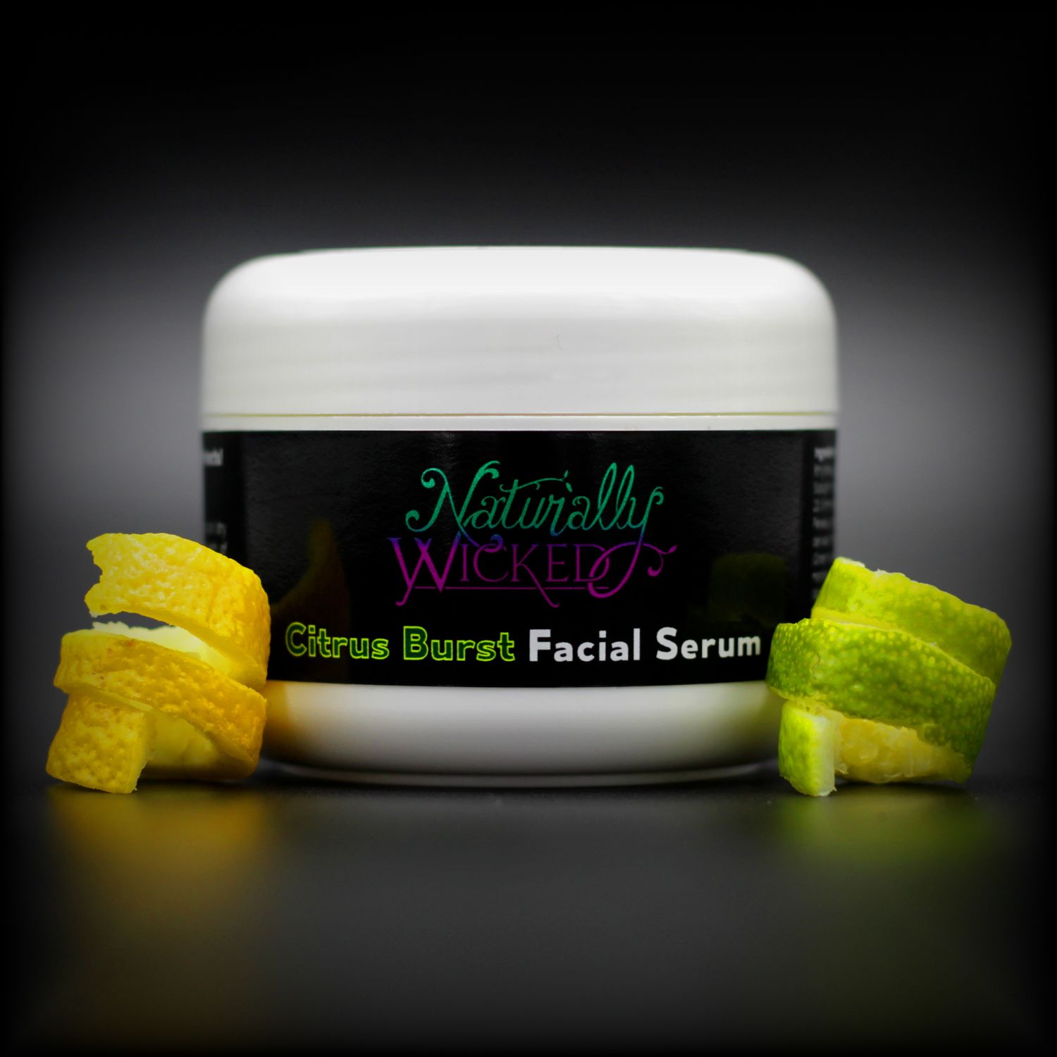 Naturally Wicked Citrus Burst Facial Serum With Sliced Yellow Lemon Twist & Sliced Green Lime Twist Either Side