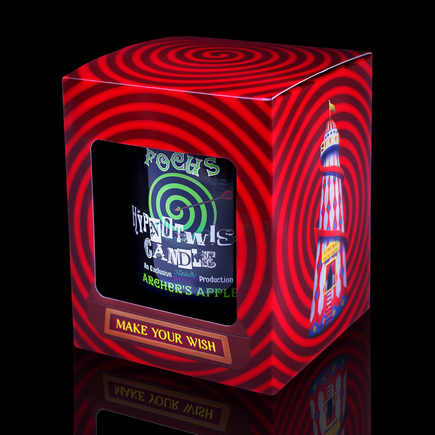 Side View Of The Naturally Wicked Hypnotwist Focus Candle, Plant-based Soy Green Wax Scented With Archer's Apple, Including A Green Aventurine Crystal Spinning Top, Mirrored Lid & Red Circus Hypnotic Gift Box