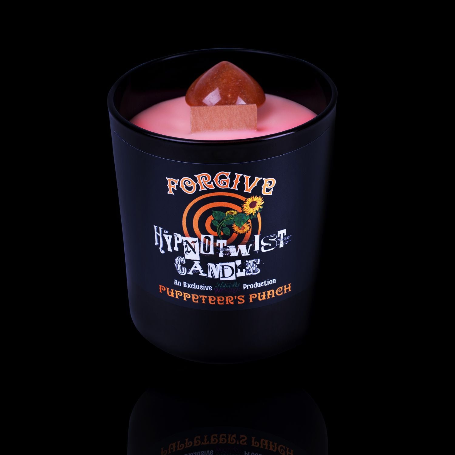 Naturally Wicked Hypnotwist Forgive Candle Featuring Plant-based Soy Orange Wax Scented with Puppeteer's Punch & Includes An Orange Aventurine Crystal Spinning Top.