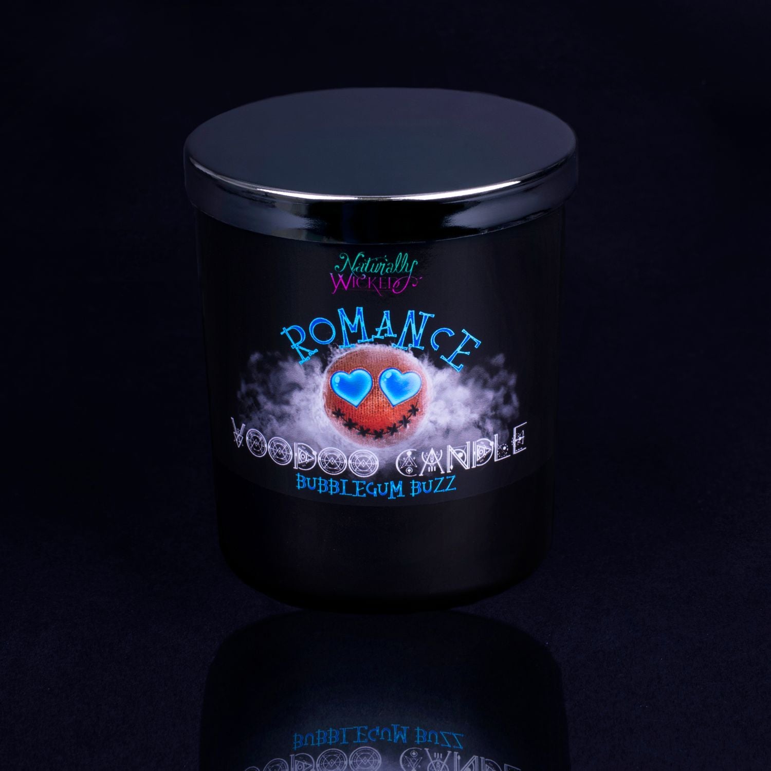 Naturally Wicked Voodoo Romance Spell Candle With Mirror Finished Exquisite Lid In Place. Featuring A Black Gloss Label, A Voodoo Doll Design And Bubblegum Buzz Scent.
