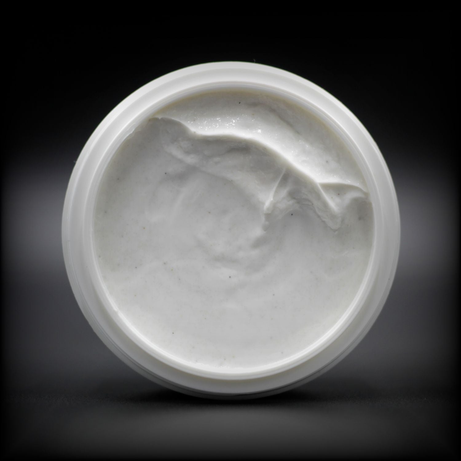 Naturally Wicked Volcanic Hand & Foot Scrub Inner Tub Showing Exfoliating White Cream With Volcanic Rock Inside