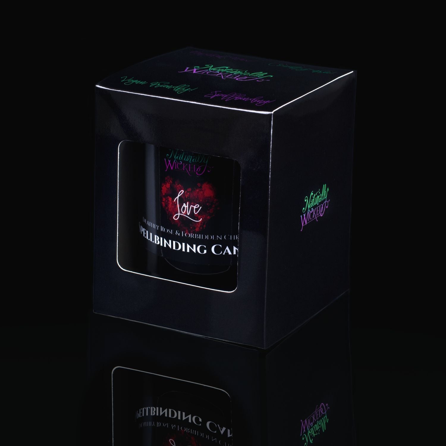 The Perfect Spell Candle For The One You Love. Naturally Wicked Spellbinding Love Candle Displayed In A Sleek Black Gloss Gift Box. The Candle Features Plant-Based Smooth Pink Wax, A Wood Wick And A Beautiful Rose Quartz Crystal.