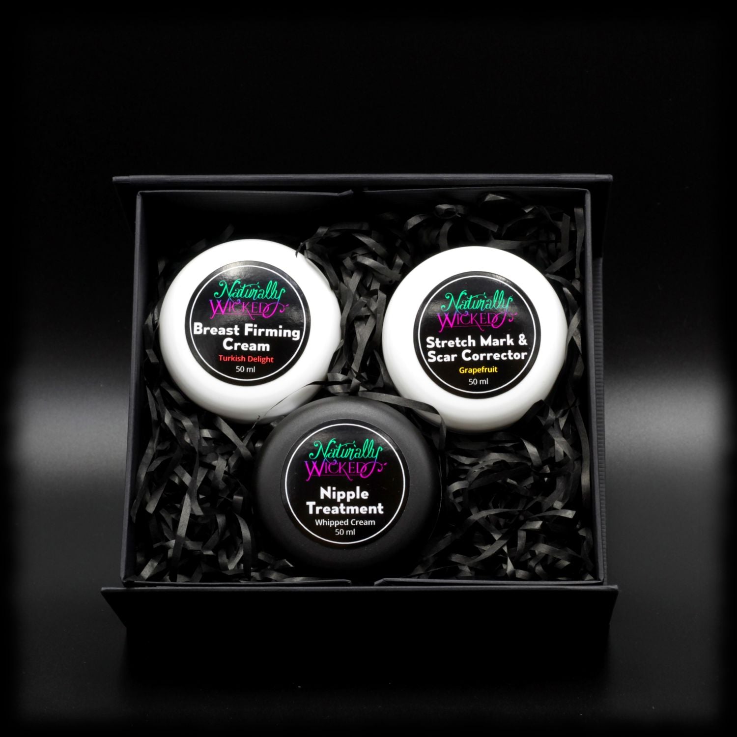 Inside View Of Naturally Wicked 3 Step Mamma Kit. Featuring Naturally Wicked Turkish Delight Breast Firming Cream, Naturally Wicked Whipped Cream Nipple Treatment & Naturally Wicked Grapefruit Stretch Mark & Scar Corrector