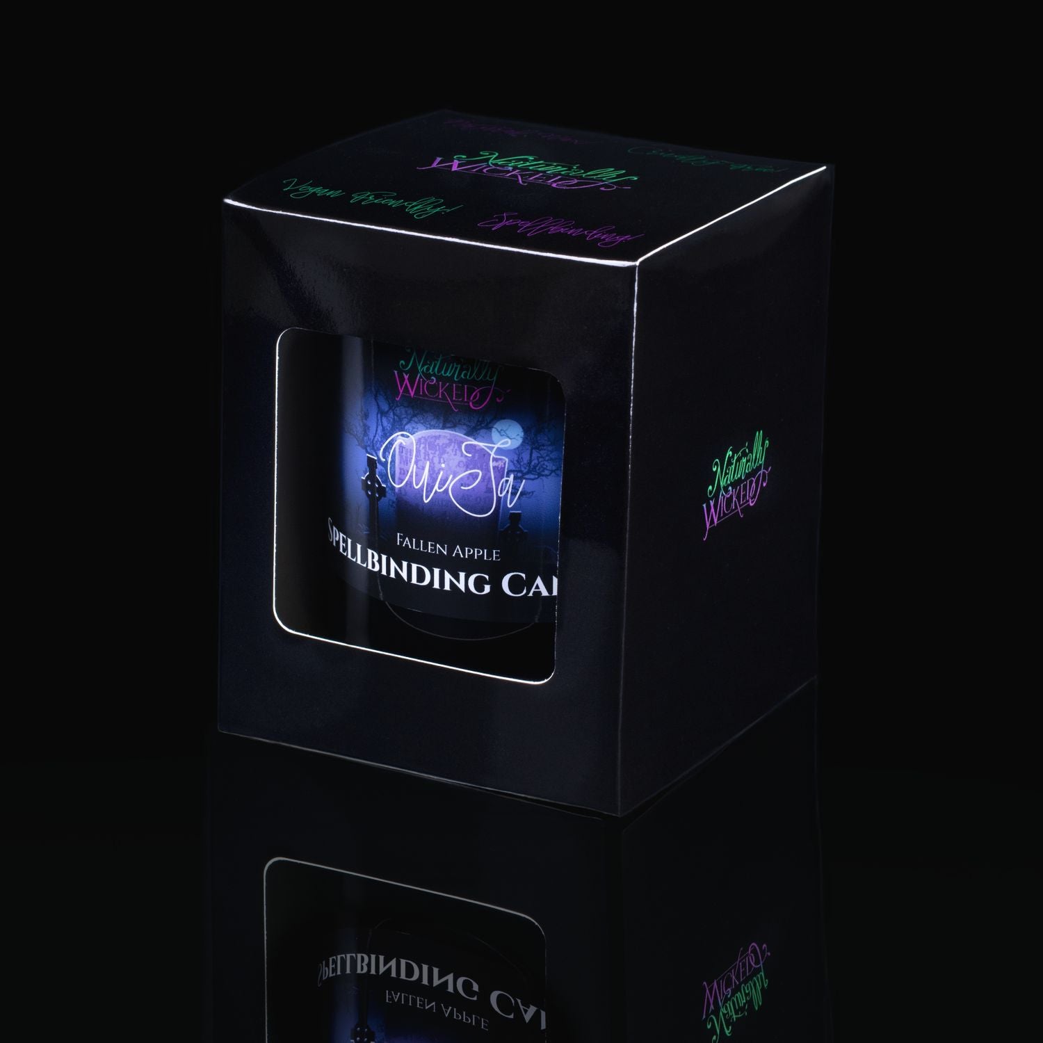 The Perfect Spell Candle For The Brave. Naturally Wicked Spellbinding Ouija Candle Displayed In A Sleek Black Gloss Gift Box. The Candle Features Plant-Based Smooth Blue Wax, A Wood Wick And A Beautiful Carved Sodalite Crystal. Panchette