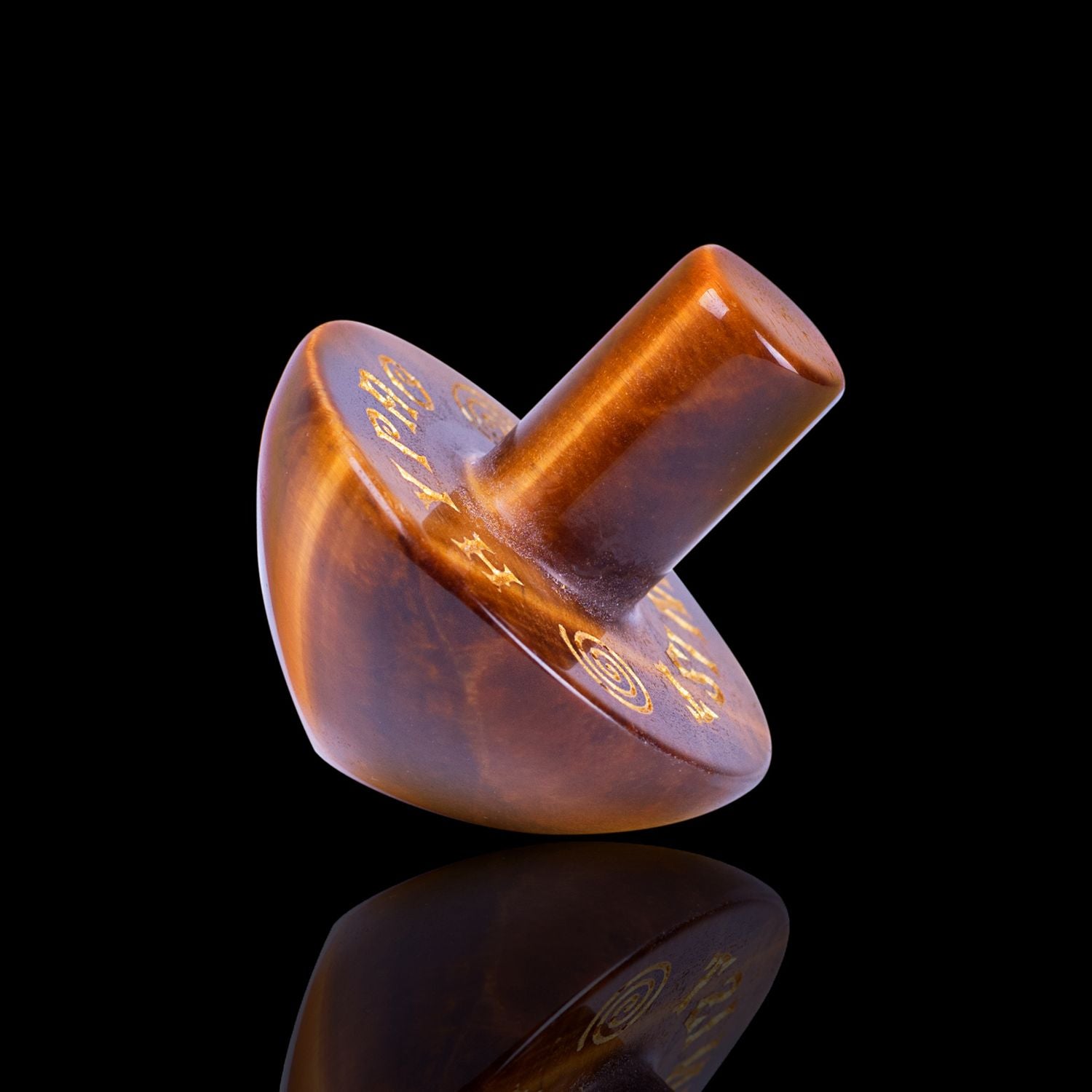 Naturally Wicked Exclusive Hypnotwister. A Tiger's Eye Crystal Spinning Top Engraved With Hypno Twist