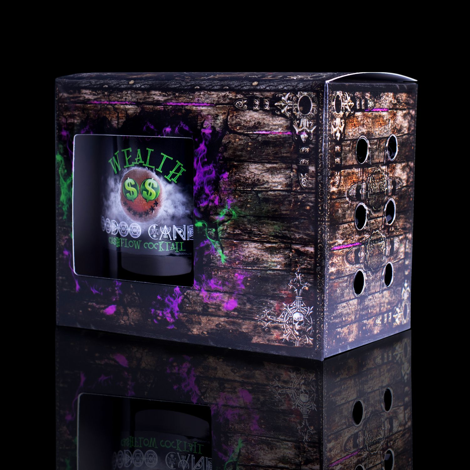 Side View Of The Fabulously Haunting Voodoo Wealth Spell Candle. Naturally Wicked Voodoo Wealth Candle Displayed In A Gift Box. The Candle Features Plant-Based Smooth Green Wax, A Wood Wick, Green Voodoo Doll And A Beautiful Green Aventurine Crystal Wand.