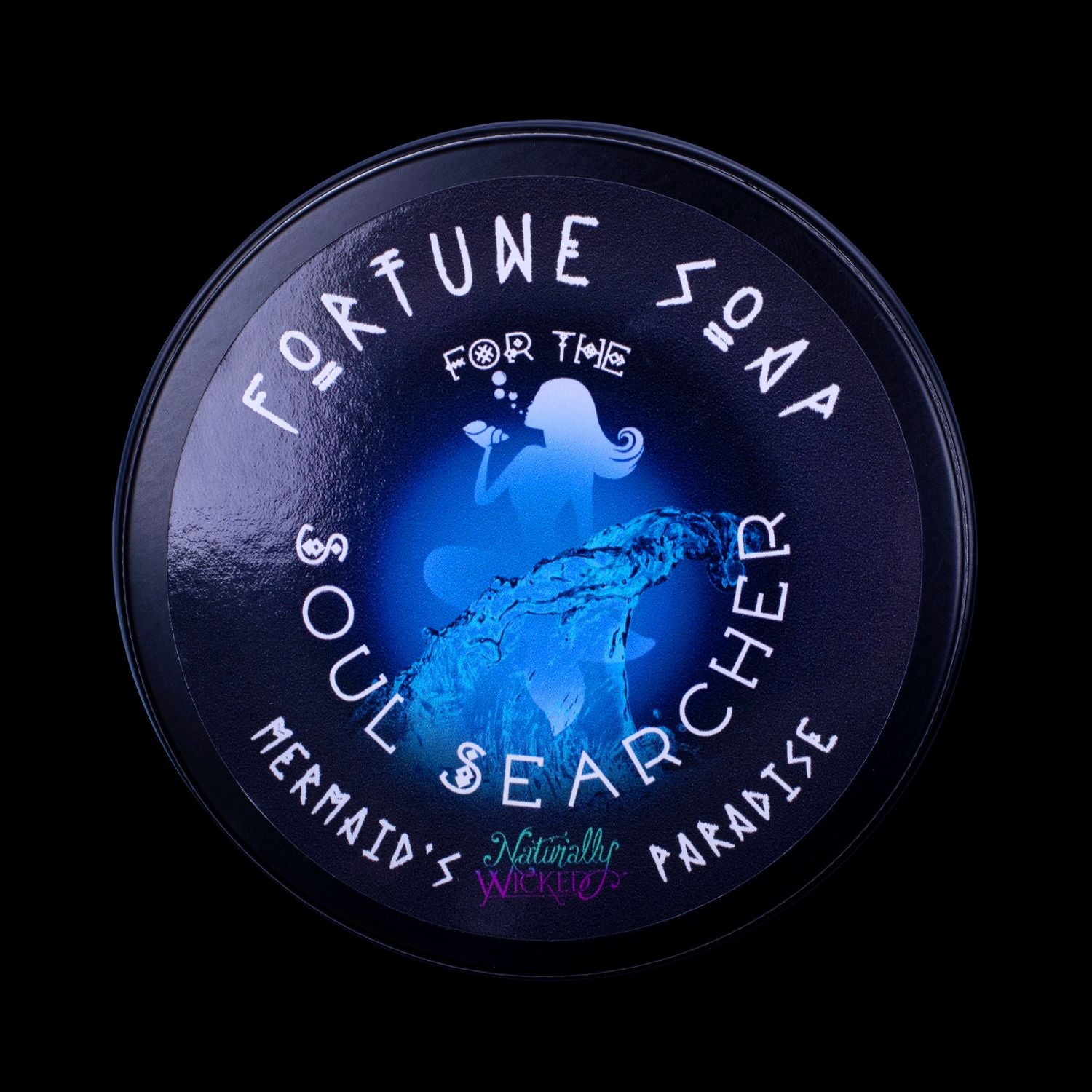 Naturally Wicked Fortune Soap For The Soul Searcher. Blue Plant-based Soap With Lapis Lazuli Rune Crystal, Scented With Mermaid's Paradise All Situated In A Black Glossy Gift Tin.